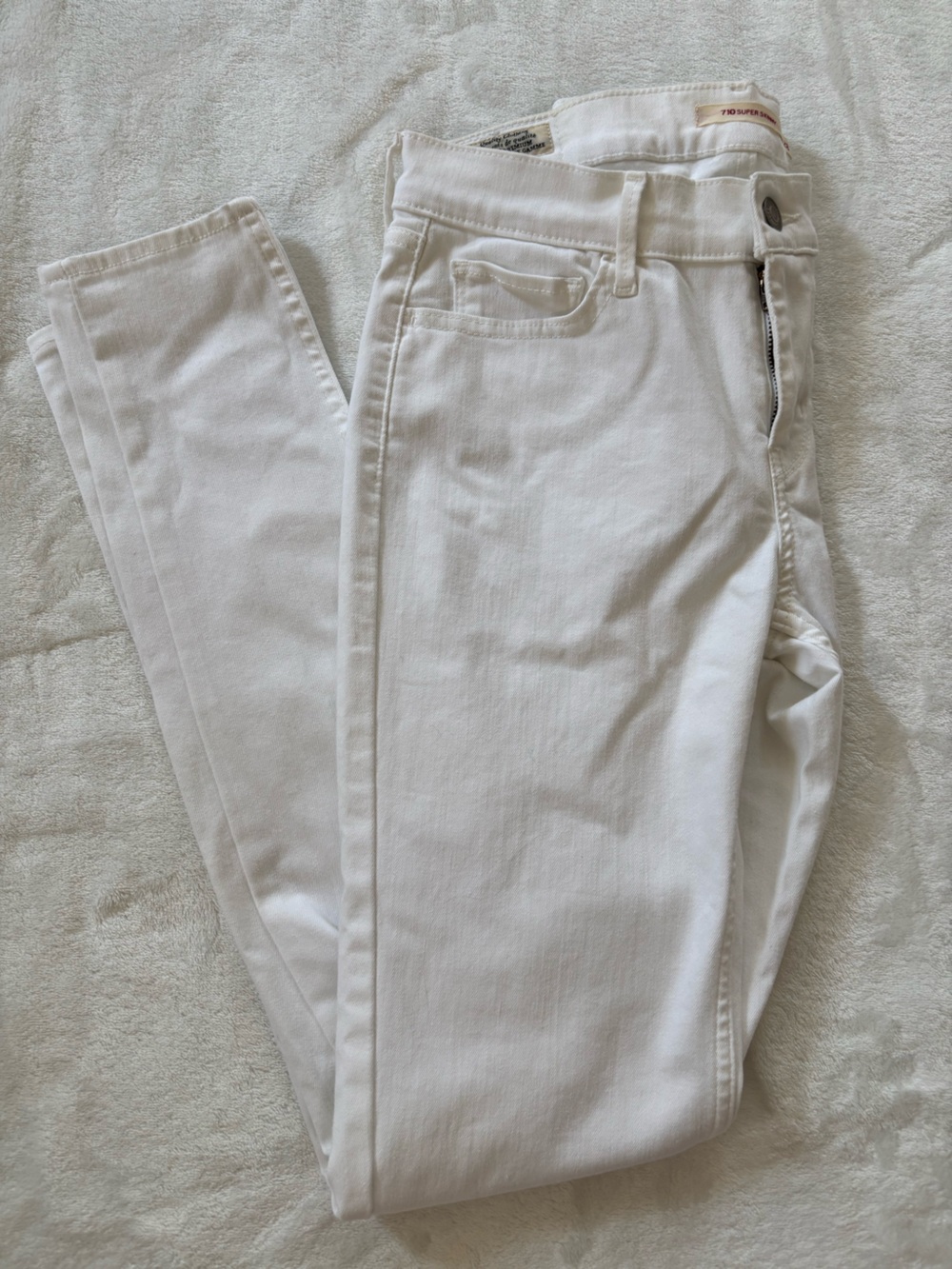 Levi’s 710 super skinny white denim